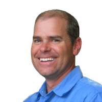 LeeRen Ray smiling in light blue shirt, representing Precision Homes and Design.